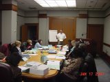 picture of Officers around a meeting table
