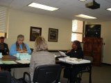 picture of Officers around a meeting table