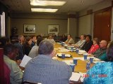 picture of Officers around a meeting table